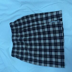 Fall colored (brown, beige, black) cloth mini skirt with small slit